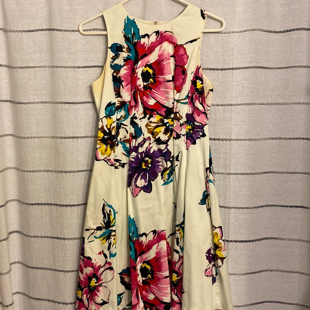white dress with floral design